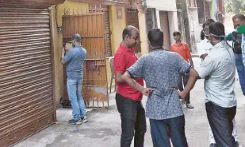 Man accused of killing elderly woman held after encounter