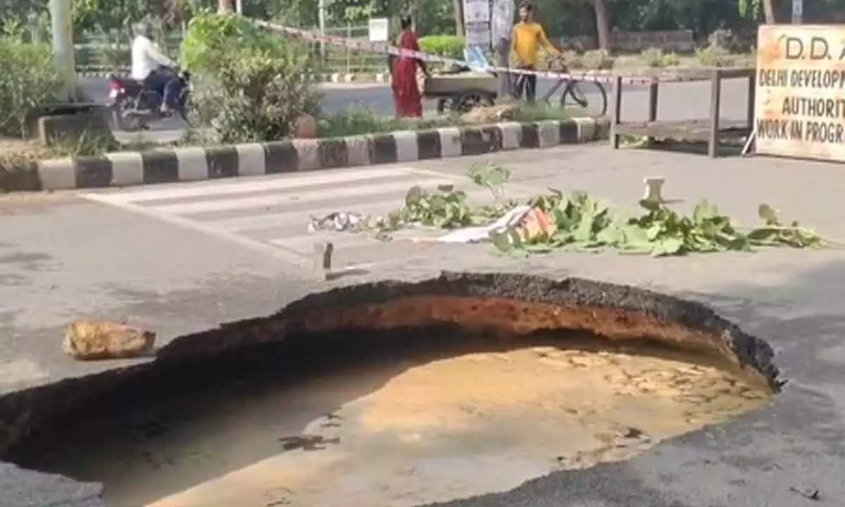 Road caves in near National Law University in Delhis Dwarka Road caves in near National Law University in Delhis Dwarka