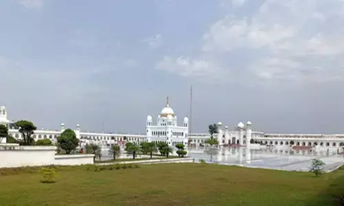Kartarpur Sahib Gurdwara in Pakistan partially submerged in floodwater of Ravi river