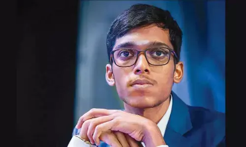 Pragg in joint lead after facile win; Gukesh loses