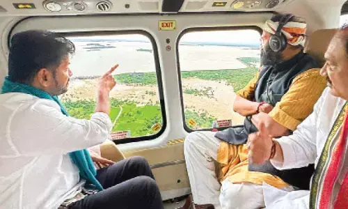Revanth makes aerial survey of affected areas