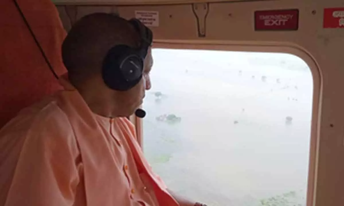 CM Yogi conducts aerial survey of flood-hit areas in UP, issues relief guidelines CM Yogi conducts aerial survey of flood-hit areas in UP, issues relief guidelines