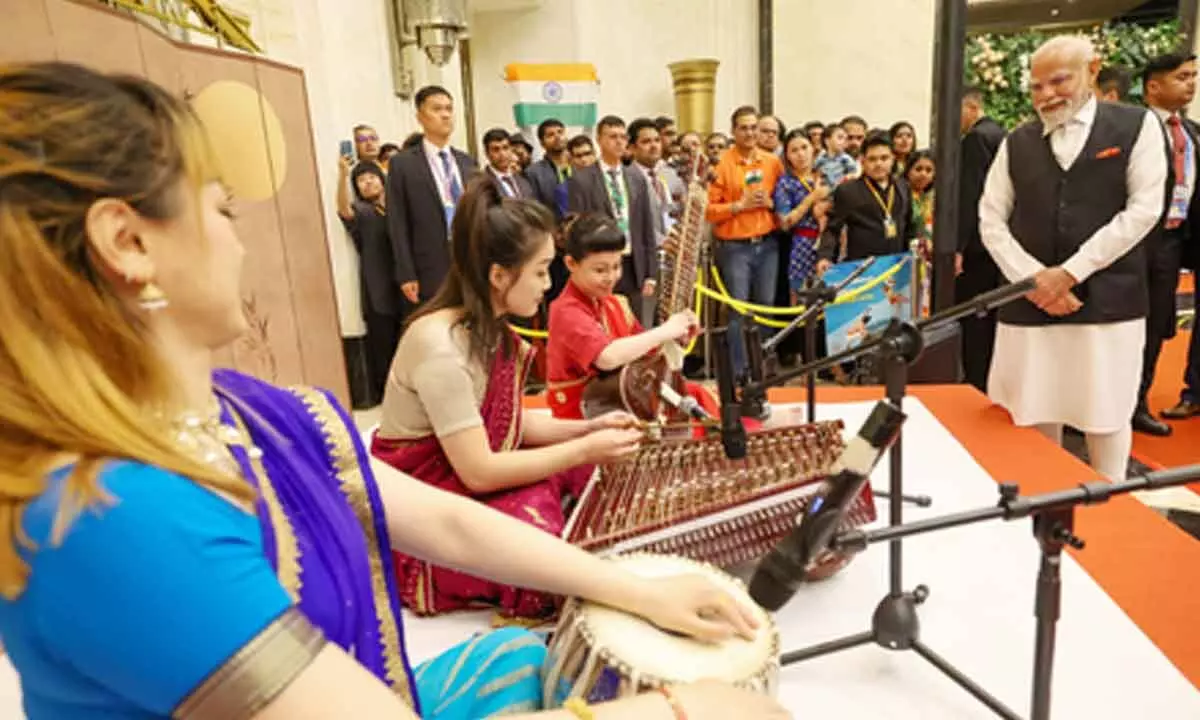 Indian diaspora in China accords rousing welcome to PM Modi Indian diaspora in China accords rousing welcome to PM Modi