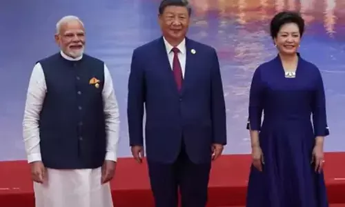 Chinese President Xi and his wife welcome PM Modi for SCO Summit reception