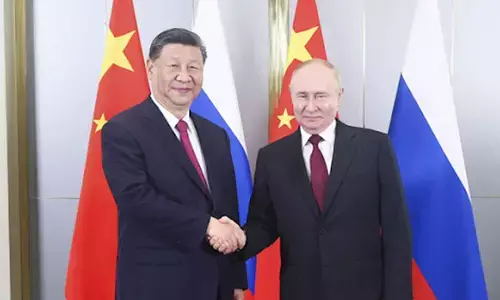 Xi, Putin reaffirm old friend ties in face of US challenges