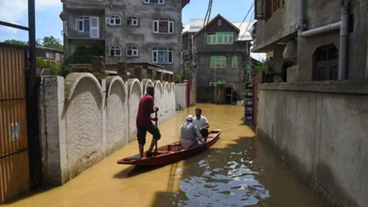 Over 9,500 shifted to safer places after Jhelum breaches embankment at two places in Kashmir Over 9,500 shifted to safer places after Jhelum breaches embankment at two places in Kashmir