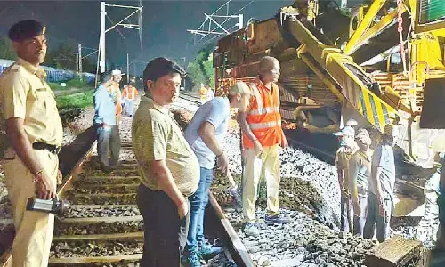 DRM monitors safety works at night in Pendurthi-Simhachalam section
