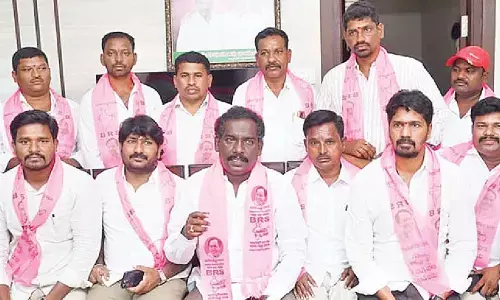 BRS slams Cong over double bedroom houses