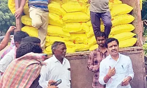 Farmers queue up for urea at Odela PACS