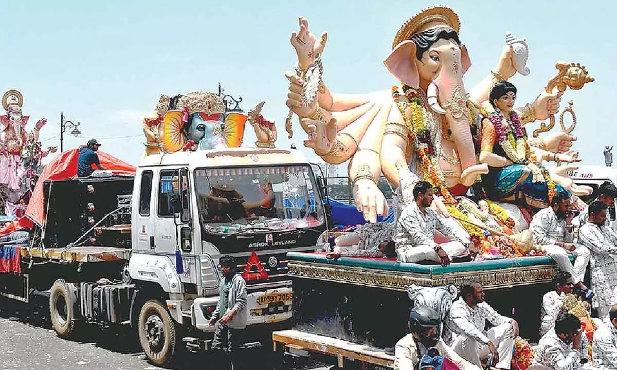 Devotees swarm Tank Bund as idol immersions continue for second day