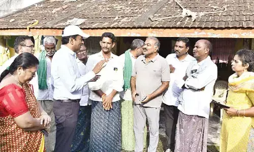 Collector tours villages to make farmers aware on urea supply