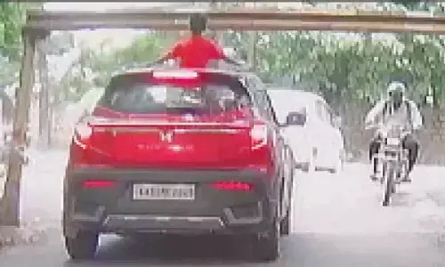 Standing through car sunroof can lead to jail, warn cops