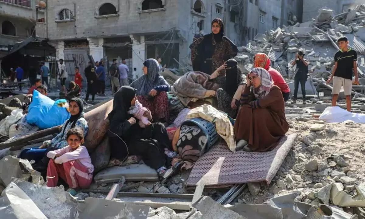 Israeli air strikes kill 65 in Gaza, including 14 from one family Israeli air strikes kill 65 in Gaza, including 14 from one family