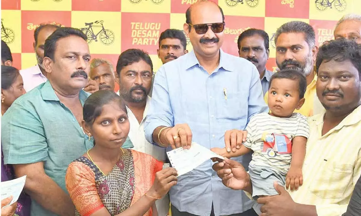 MINISTER Parthasarathy distributes CMRF cheques
