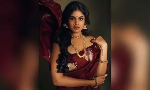 Faria Abdullah redefines elegance with fierce maroon saree look