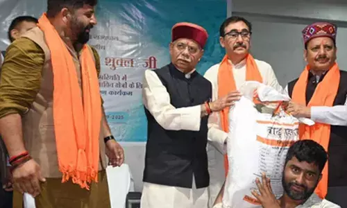 Himachal Governor distributes relief material among flood-hit