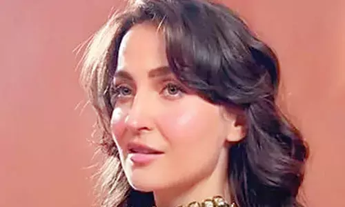 Elli AvrRam talks about the importance of ‘lifting heavy weights’ for women