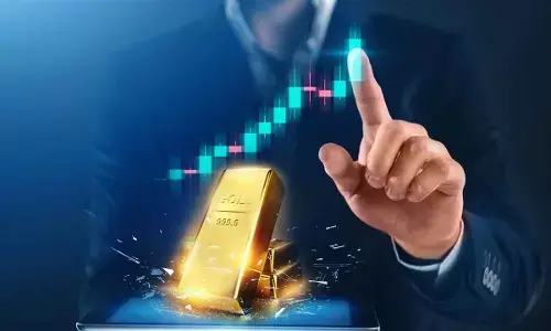 Gold prices surge to record high amid safe haven demand