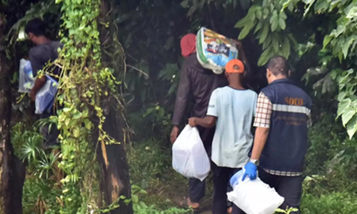 Dharmasthala case: SIT resumes excavation operation; collects bones, soil Dharmasthala case: SIT resumes excavation operation; collects bones, soil