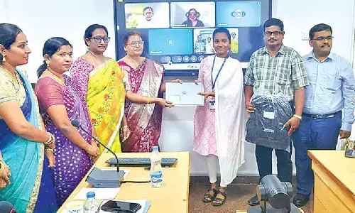 Students receive laptops