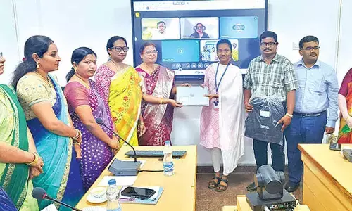 Students receive laptops