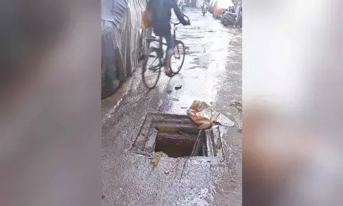 Open manholes turn death traps for denizens