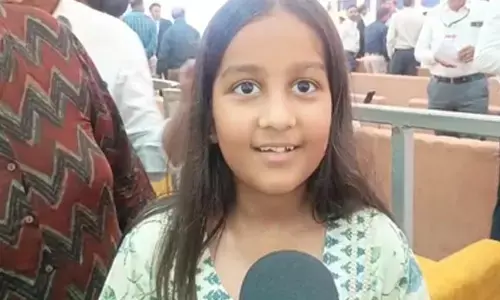 Gujarat: Girl presents photo collage during Bhavnagar rally depicting PM Modi’s moments with his mother