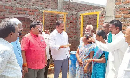Ade inspects construction work in Boath hamlet