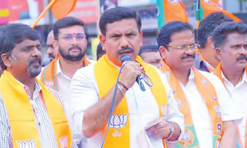 BJP leaders celebrate new GST rates with sweets, public outreach