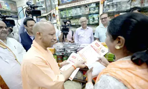 CM Yogi visits Lucknow shops, assures biggest GST benefits to UPs traders and consumers