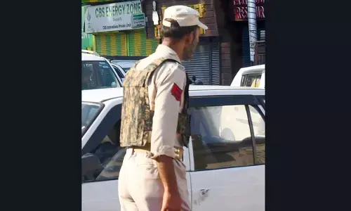 J&K Police enforce community duty on three found intoxicated in public