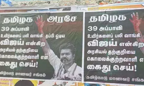 Posters demanding Vijay’s arrest appear in Karur after stampede tragedy during TVK rally