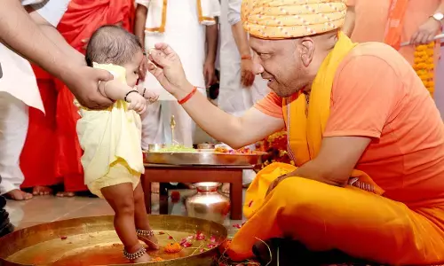 CM Yogi performs Kanya Pujan, worships Matru Shakti