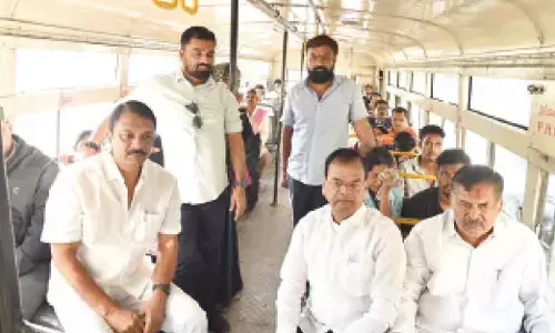 BRS MLAs travel in bus to protest RTC fare hike