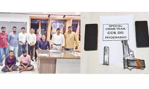 Two Fruit vendors held for possessing country-made pistol