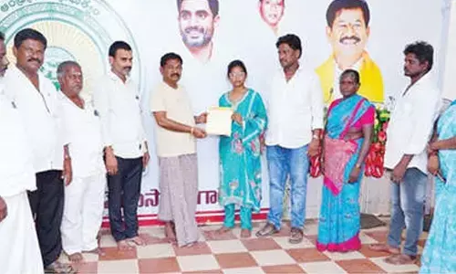 Family of TDP activist gets insurance cheque