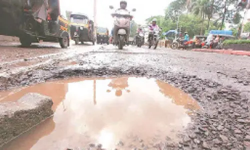 Bengaluru’s ‘immortal’ potholes spark clash between industrialists and govt