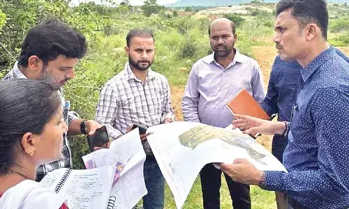 Collector inspects crop fields and agricultural research center