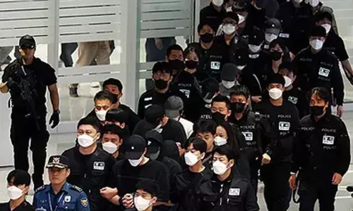 Cambodia deports 64 South Korean online scam suspects