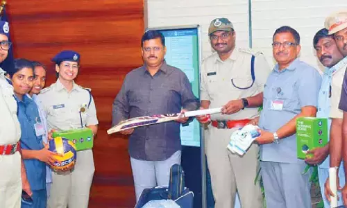 CP presents sports kits to dept staff