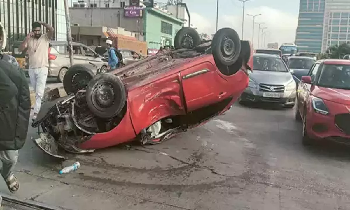 Car Crash Causes Chaos on JNTU Bridge in Hyderabad Car Crash Causes Chaos on JNTU Bridge in Hyderabad