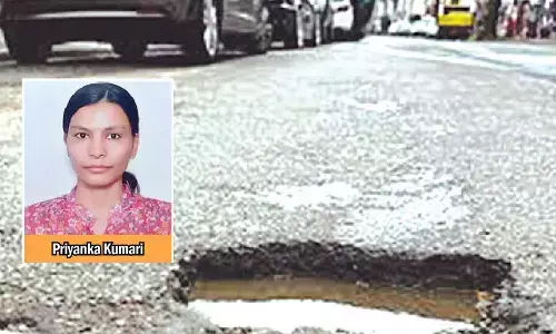 Woman killed after falling off bike