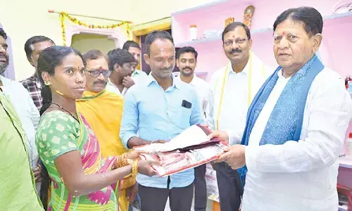 Sudarshan Reddy lauds beneficiaries for completing house construction
