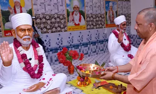 Box  CM Yogi Adityanath unveils statues at Kabirdham Ashram, plants Rudraksh tree