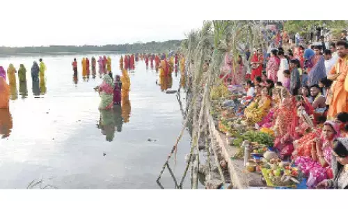 Chhath Puja celebrated with devotion across city: Spirit of Chhath shines bright at Hussain Sagar, Borabanda