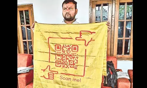 Sircilla weaver designs silk shawl with QR code