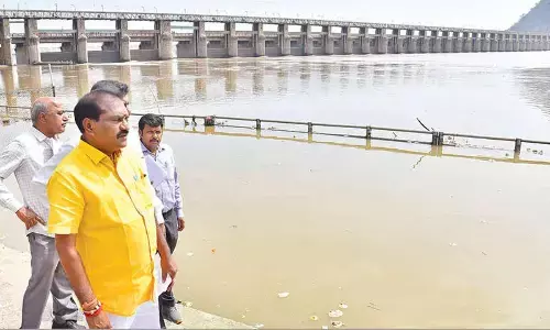 Nimmala alerts officials on flood in Krishna river