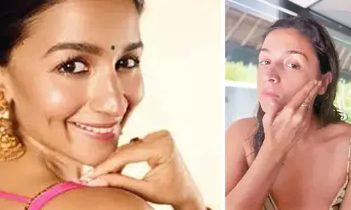 Alia Bhatt flaunts a perfect hair flip while doing her makeup