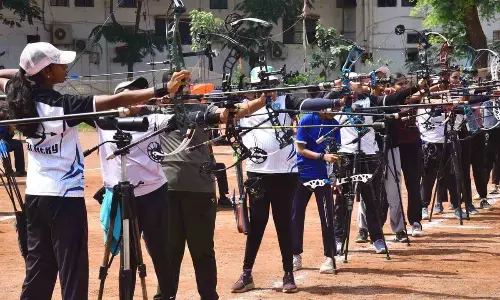 Compound Archery champions Charan Srikar, Lehya Reddy