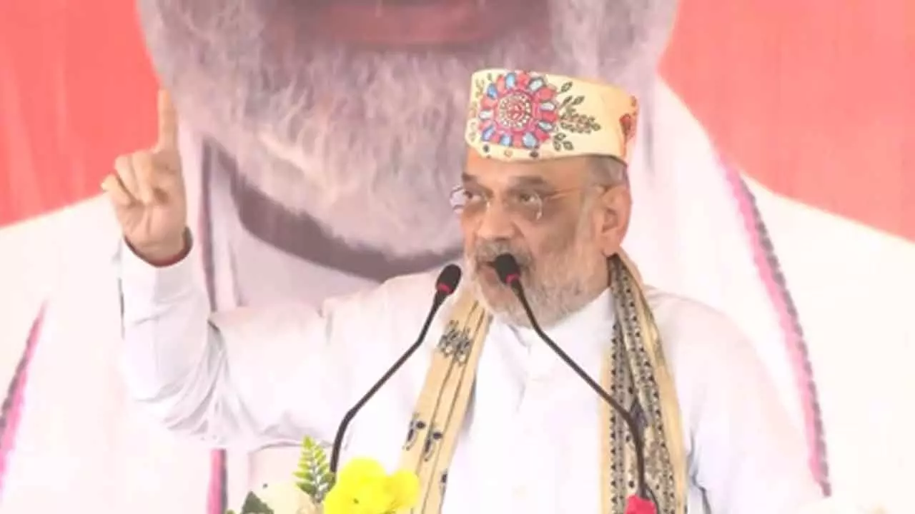 RJD, Cong embroiled in corruption; vote for development, says HM Shah in Darbhanga RJD, Cong embroiled in corruption; vote for development, says HM Shah in Darbhanga